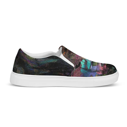 Close-up of Hipyfi Women’s Chromatic Dreams slip-on sneakers, showcasing a modern abstract face design with multicolor, elastic side accents, and a cushioned sole for comfort. white-left-inside
