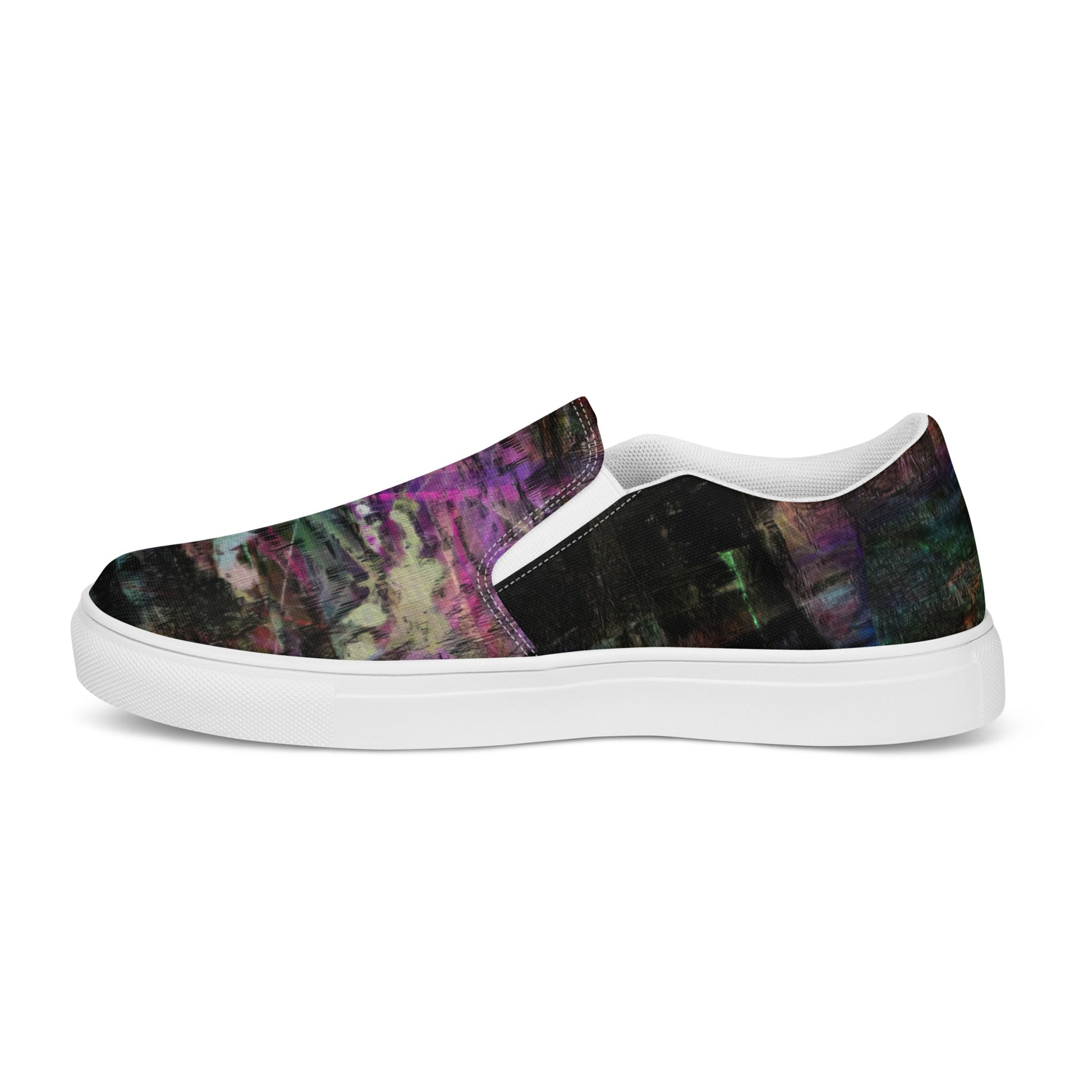 Close-up of Hipyfi Women’s Chromatic Dreams slip-on sneakers, showcasing a modern abstract face design with multicolor, elastic side accents, and a cushioned sole for comfort. white-left-outside