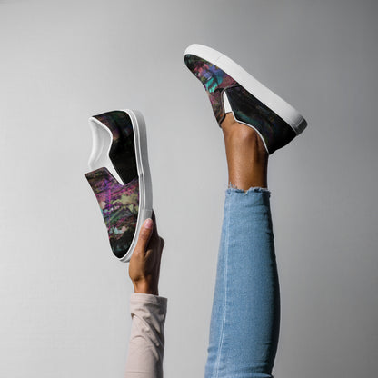 Close-up of Hipyfi Women’s Chromatic Dreams slip-on sneakers, showcasing a modern abstract face design with multicolor, elastic side accents, and a cushioned sole for comfort. white-right