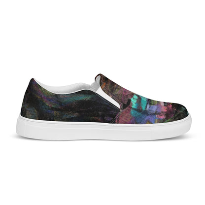 Close-up of Hipyfi Women’s Chromatic Dreams slip-on sneakers, showcasing a modern abstract face design with multicolor, elastic side accents, and a cushioned sole for comfort. white-right-outside